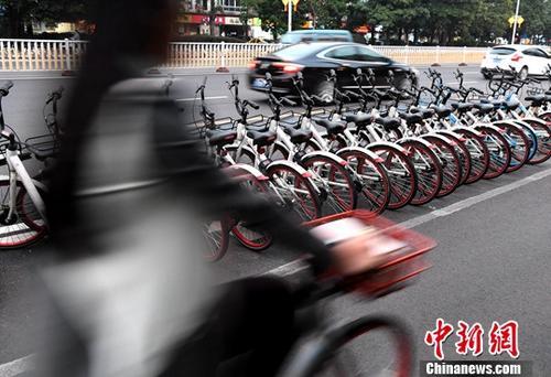 POS机领取：共享单车投放数量减半 北京公共自行车使用回暖